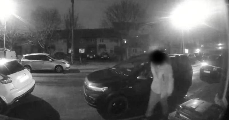 Footage captures man attempting to break into car