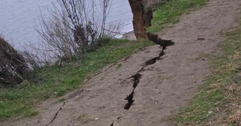 Coastal footpath collapsing into sea as huge cracks appear