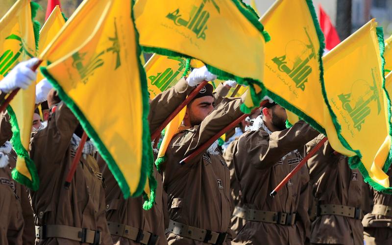 Hezbollah official killed in drive-by shooting outside his home in eastern Lebanon