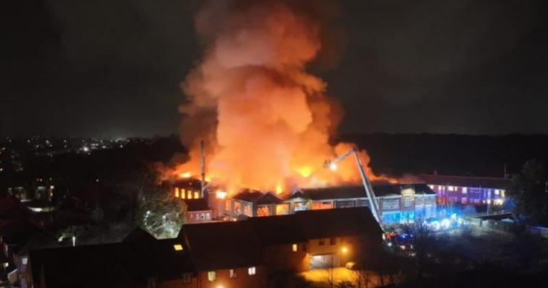 Door knock debris checks in place after shoe factory fire