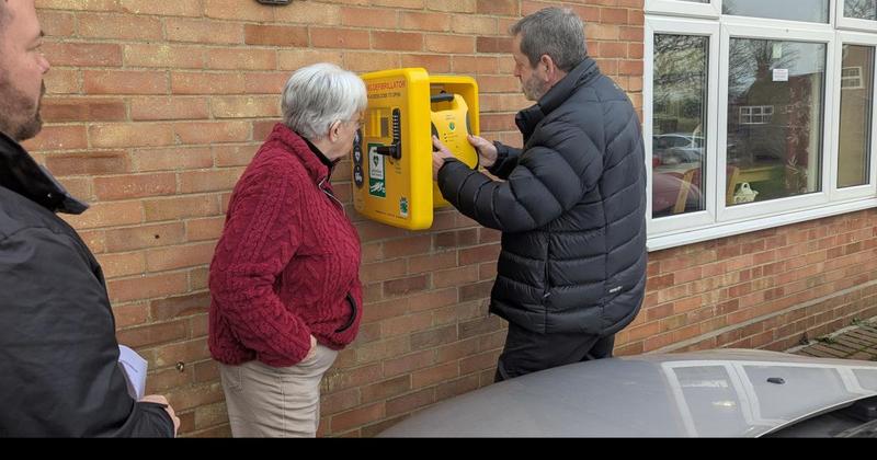 Community centre finally receives defibrillator after year-long wait