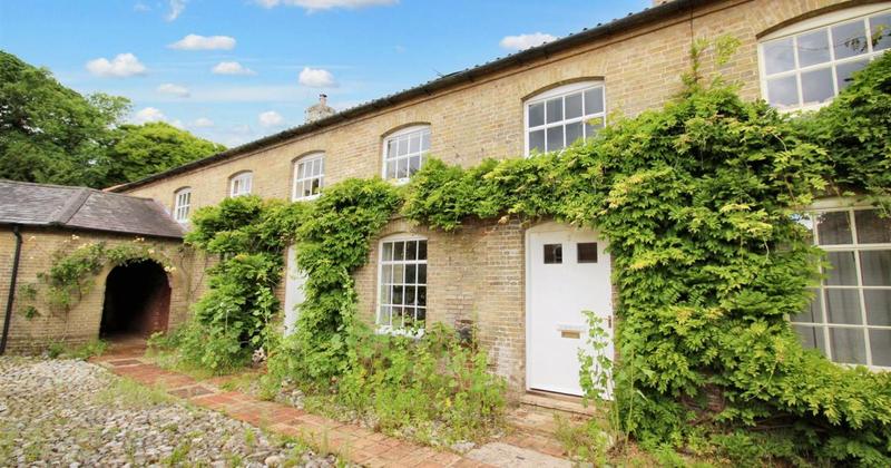 Period cottage in Gunton Park grounds heading to auction