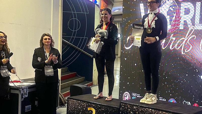 Pole dance e cerchio aereo. Ori per Federica Ghirardini e Giada Modonesi. Il team Flygym ai campionati mondiali