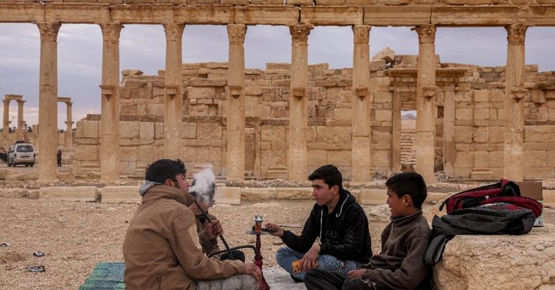 Syrians back to famed Palmyra ruins scarred by IS