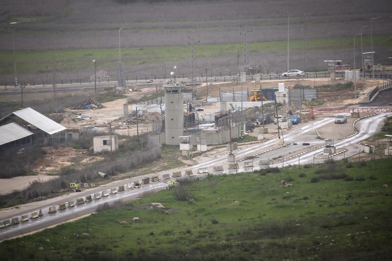 Troops neutralize explosive-laden car, Palestinian shot near army base, in West Bank