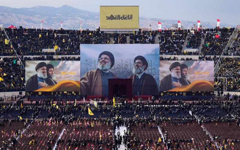 Tens of thousands pack stadium for Nasrallah funeral, as Israeli fighters fly overhead