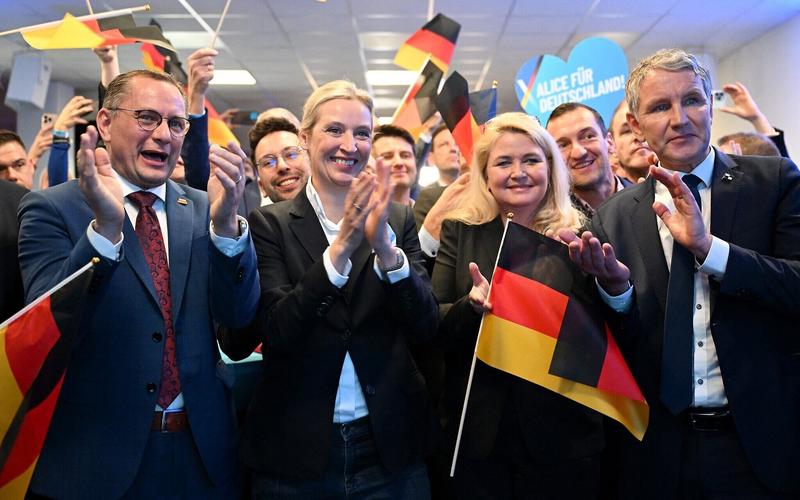 German exit polls give conservatives lead, as far right has best post-war showing