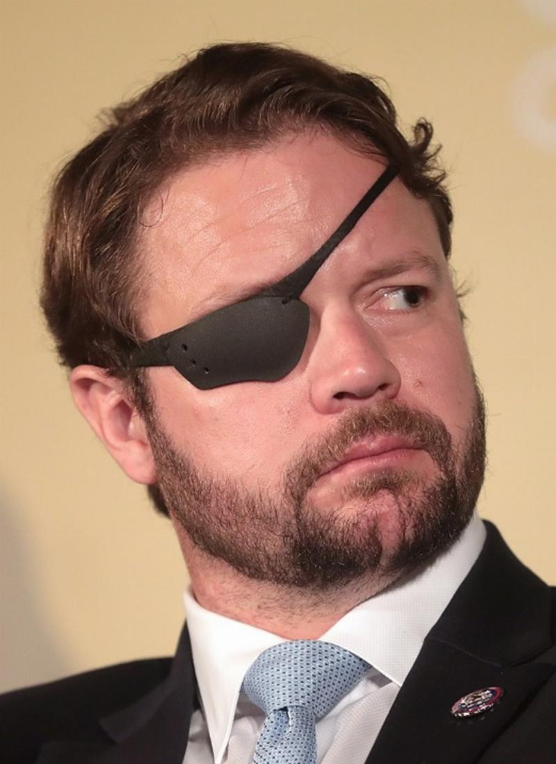 Why Does Dan Crenshaw want to kill Tucker Carlson?