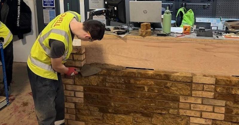 College's brickies welcome large donation of surplus heritage material