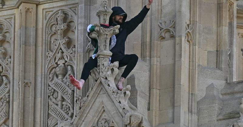 Man with Palestinian flag scales London's Big Ben clock tower